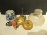 a lot of glass and brass items on the table