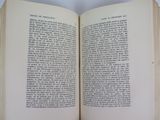 an open book that is sitting on a table