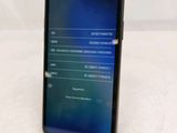 the back of a black samsung s9 with a display on the screen
