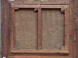 an old wooden frame with a window and a piece of fabric