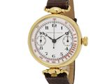 a close up of a wrist watch with a white dial and brown leather strap