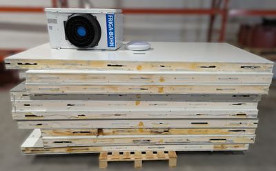 a stack of boxes that have a camera on top of them