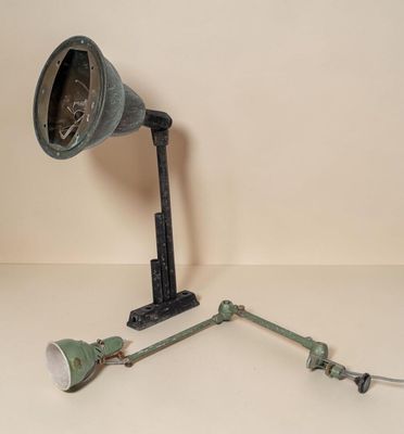an image of a lamp and a pair of pipes on a table