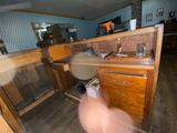 a blurry image of a person in a kitchen