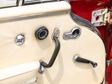 a close up of a car door with a handle on it