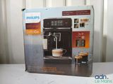 a box that has a coffee machine inside of it