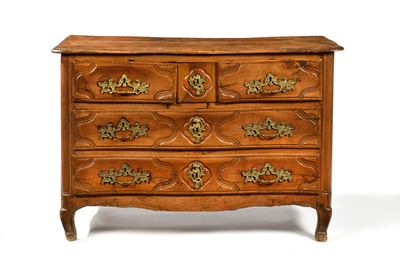 a wooden chest of drawers with brass hardware on the drawers