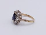 an antique sapphire and diamond cluster ring