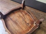 a wooden tray that is sitting on a wooden table