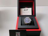 a watch that is in a box on a table