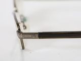 the glasses are made of metal and have a black frame