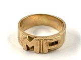 an image of a gold ring with the letter n on it