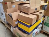 many boxes stacked on top of each other in a warehouse