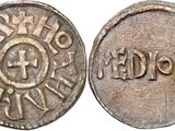 a close up of a coin on a white background