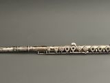 an image of a flute that is laying on a table