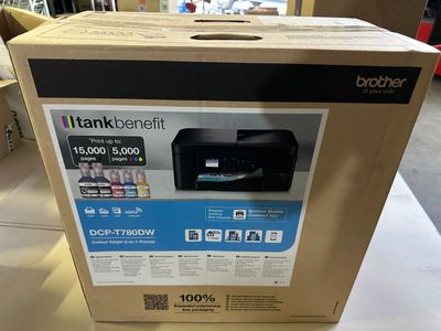 the box of the printer is sitting on the table in the store