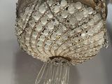 chandelier made of glass beads and silver metal frame