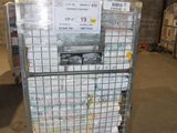 a cart with a lot of boxes on it in a warehouse