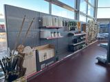 many items on the shelves in the store for sale