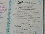 an old document with a bird on it sitting on a table