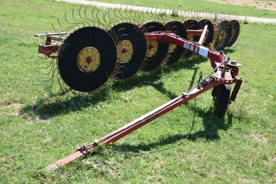 an image of a tractor plow in a field