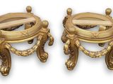 pair of antique brass candlesticks with a mirror on each side
