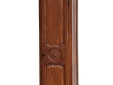 a tall wooden grandfather clock on display against a white background