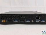 a close up of a black computer with two ports on top of it
