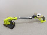 a close up of a corded blower and a blower on a table