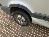 an image of a van that is parked on the side of the road