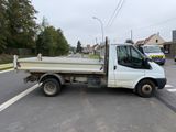 a white truck that is parked on the side of the road
