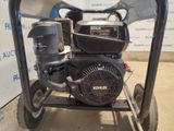 an image of a small engine on a cart