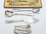 a box of silverware sitting on a table