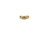 a close up of a gold ring with a diamond on it