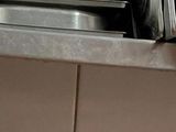 a rack of dishes and utensils in a kitchen