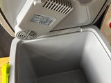 a cooler that is sitting on a yellow table
