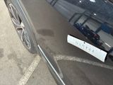 a sticker on the hood of a black car