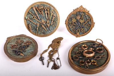 four different types of jewelry on display on a white surface