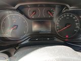 a close up of a car dashboard with various gauges
