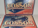 two advertising signs for a baseball team are displayed on a table