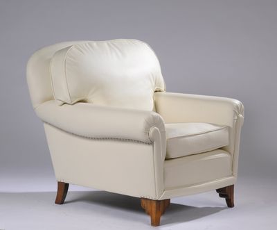 an image of a white leather chair on a grey background