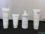 three bottles of phytomer and a tube of lotion