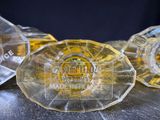 three clear glass awards sitting on top of a table