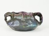 an image of a purple vase with handles on a white background