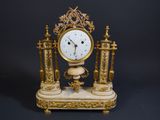 a clock that is sitting on top of a table