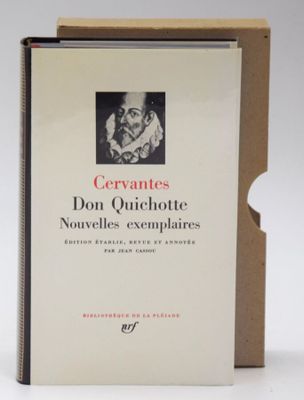 an open book with a picture of a woman in a dress