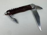 a knife that is laying on top of a knife holder