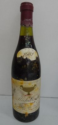 a bottle of wine that is sitting on a table