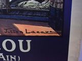 a picture of a book with a picture of a man sleeping on a bed