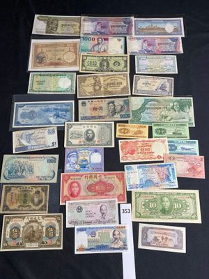 several different types of paper money laid out on a table